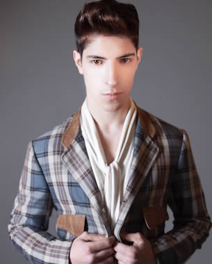 male model with slick hair and checked blazer